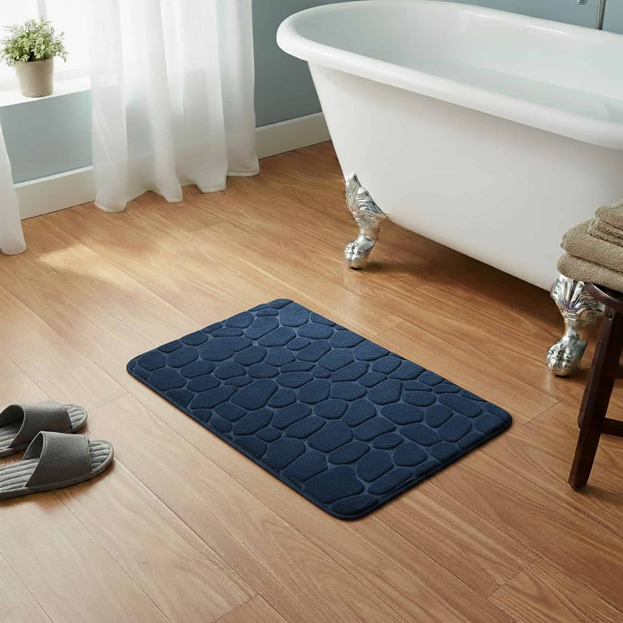 evideco-tapis-de-bain-bleu-marine-galets-m-moire-de-forme-80x50 image 1